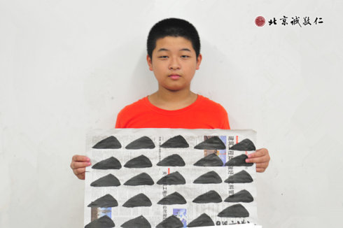 配圖：書法班學(xué)員永字八法習(xí)作展示